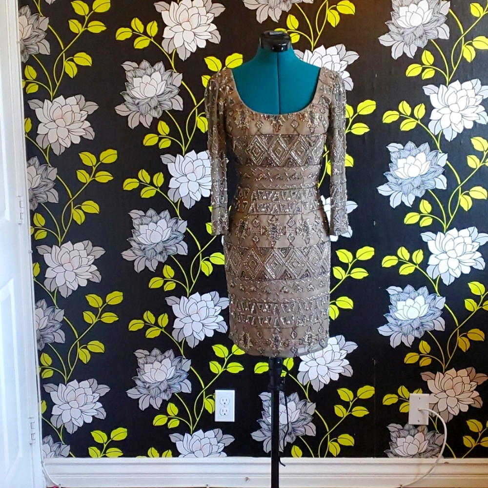 By SHAIL K. Size 0 and Silver/Gray